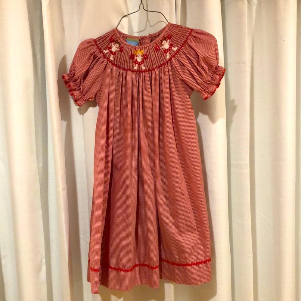 Dress velani classic from stork land/name dropper